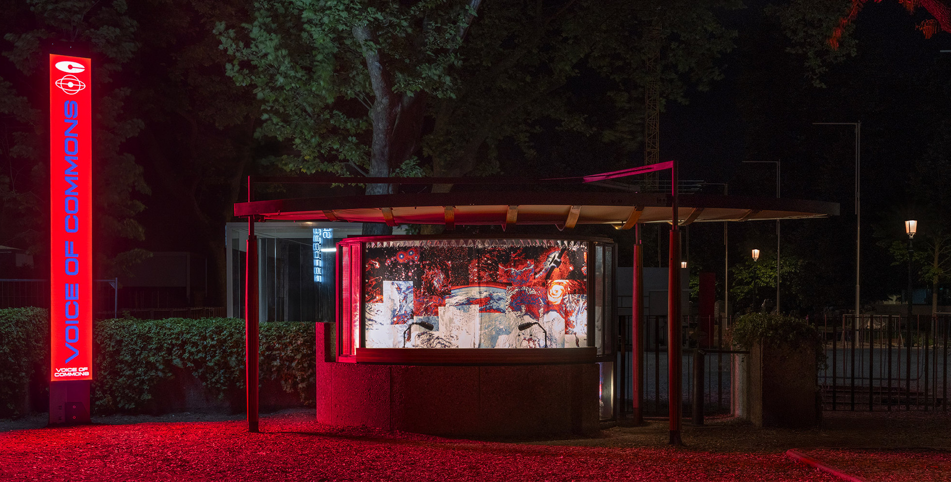 Scarpa’s restored ticket booth lit in red for the Biennale at the Giardini in Venice.