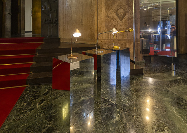 Image of three Tolomeo Micro Table displayed at the exhibition.
