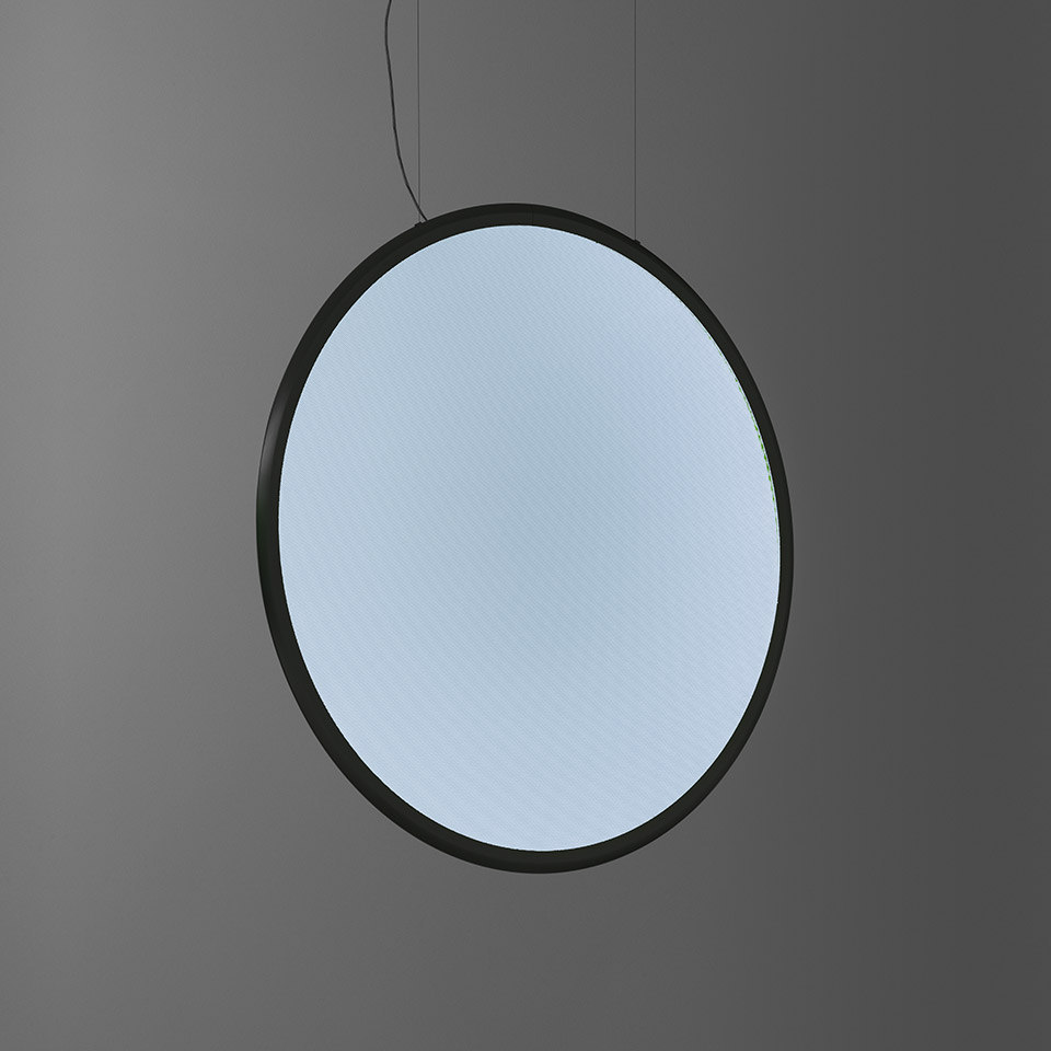 Artemide Discovery pendant lamp: large circular disc with black frame and glowing opal diffuser, suspended by thin black cable