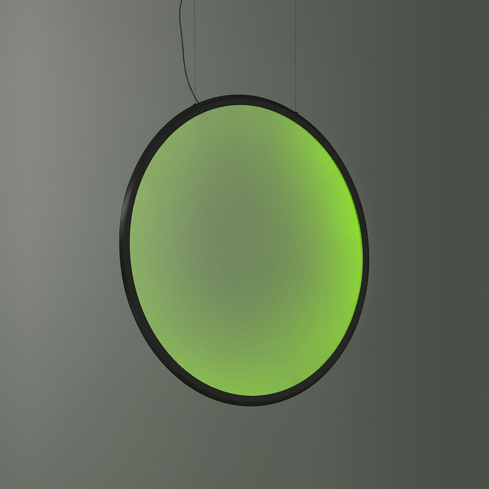 Artemide Discovery pendant lamp: large circular disc with black frame emitting vibrant green gradient light, suspended by thin cable