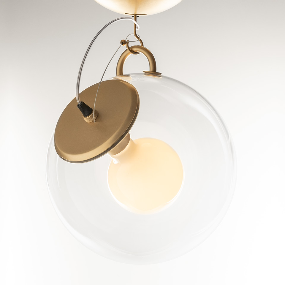 Artemide Miconos pendant lamp: clear glass sphere enclosing opal globe bulb, with brushed brass disc diffuser and brass hook suspension - 2