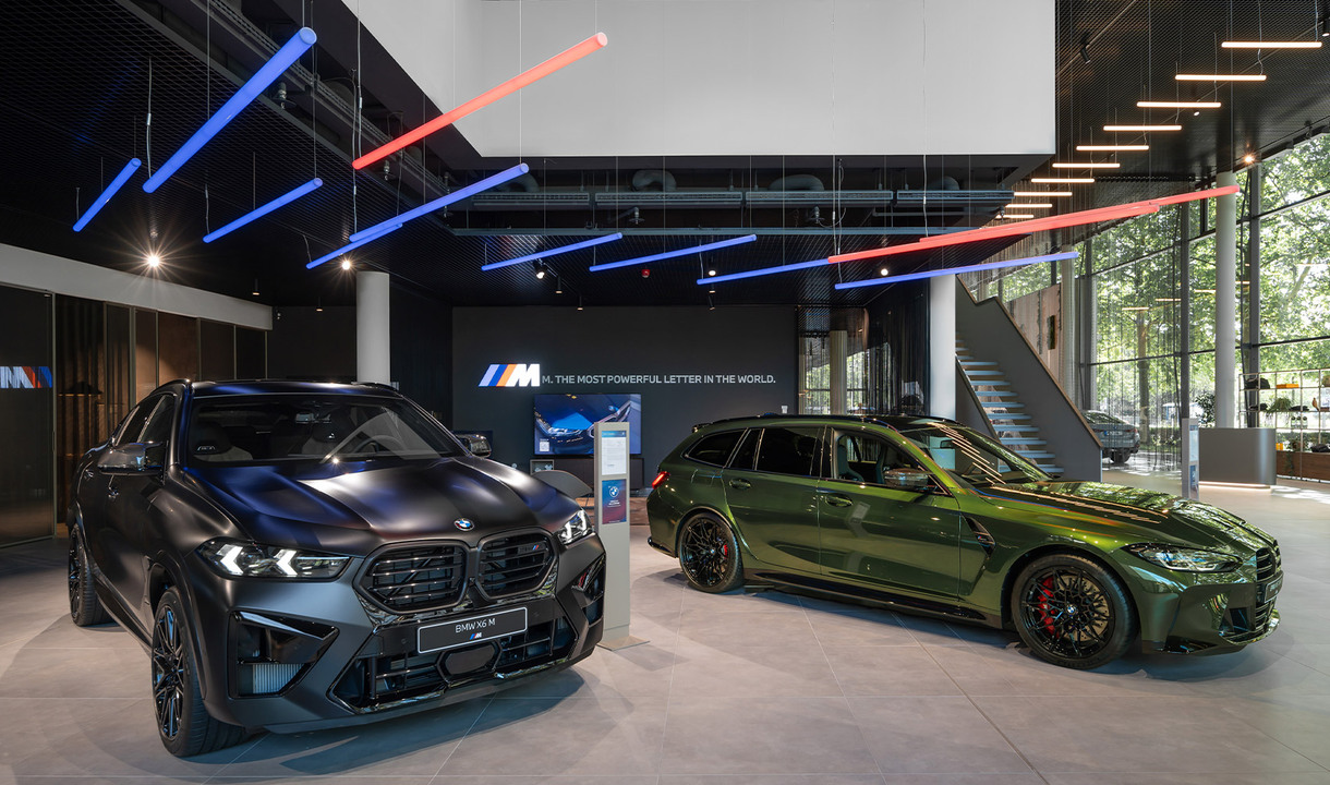 Two cars illuminated by Alphabet of Light Linear Special RGB.