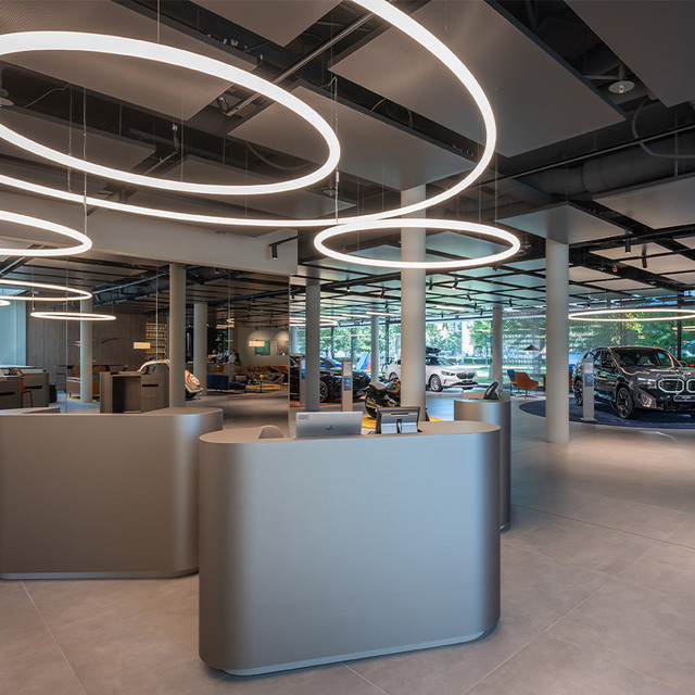 Reception area illuminated by Alphabet of Light Suspension Circular.