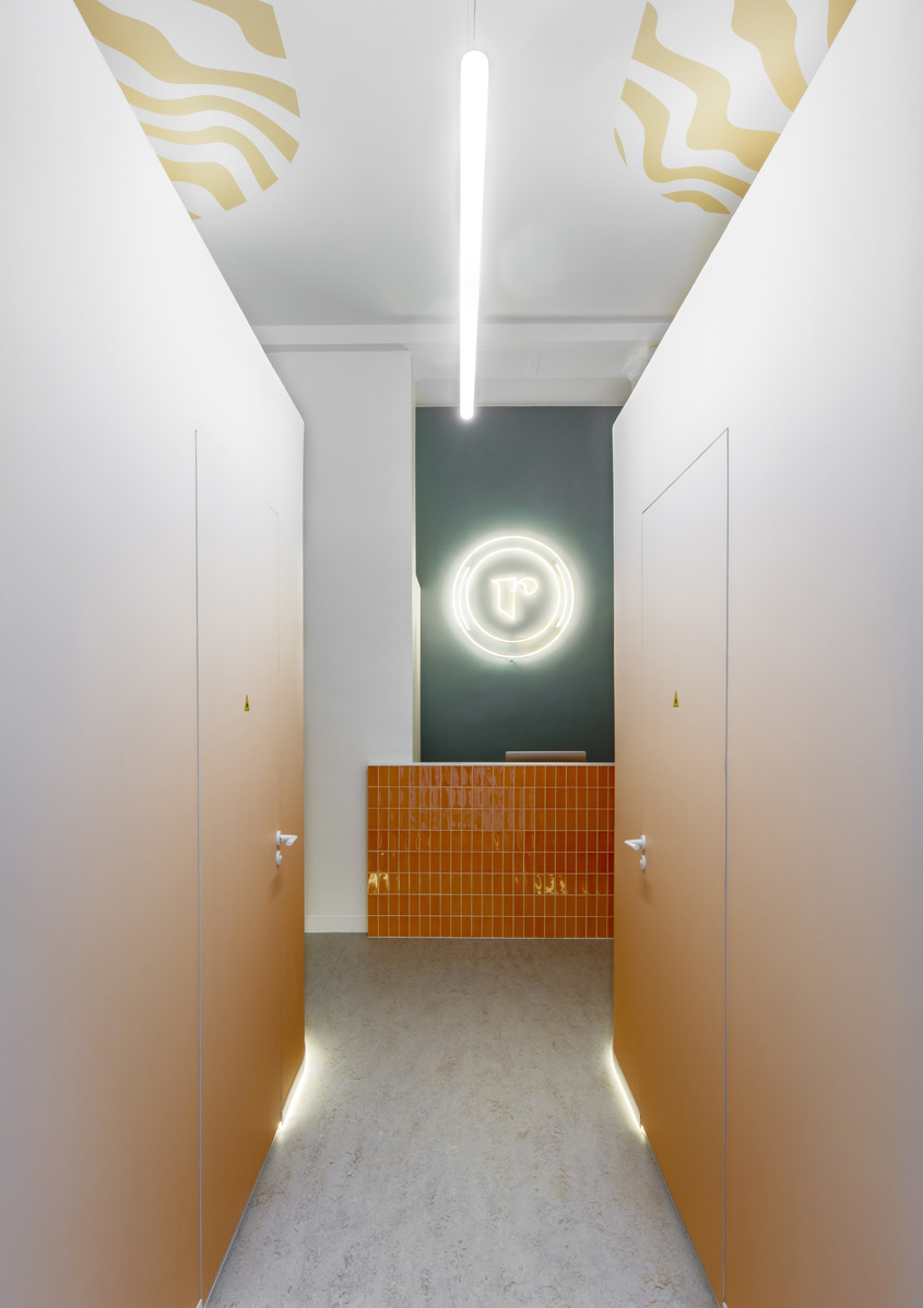 Studio corridor illuminated by Alphabet of Light Linear.