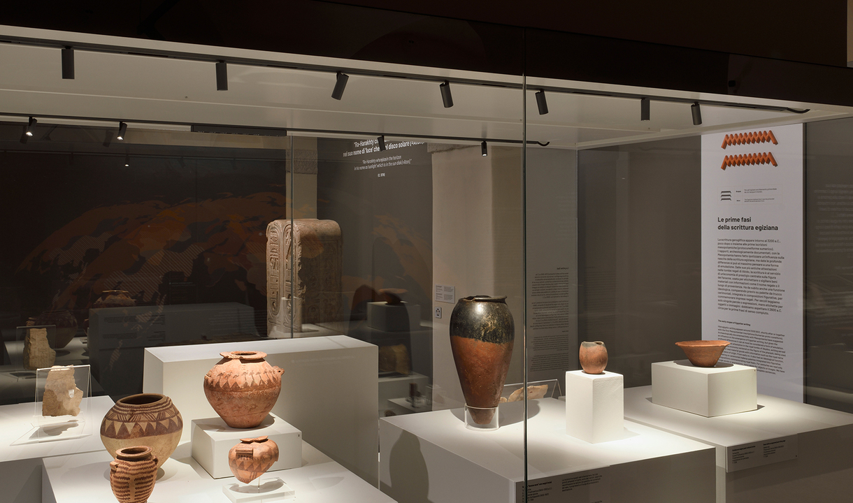 Image of an Egyptian Museum display case illuminated by Turn Around + Vector