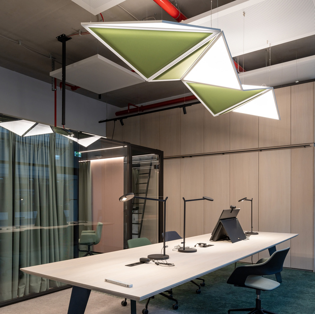 Image of Flexia and Demetra Table inside an office.